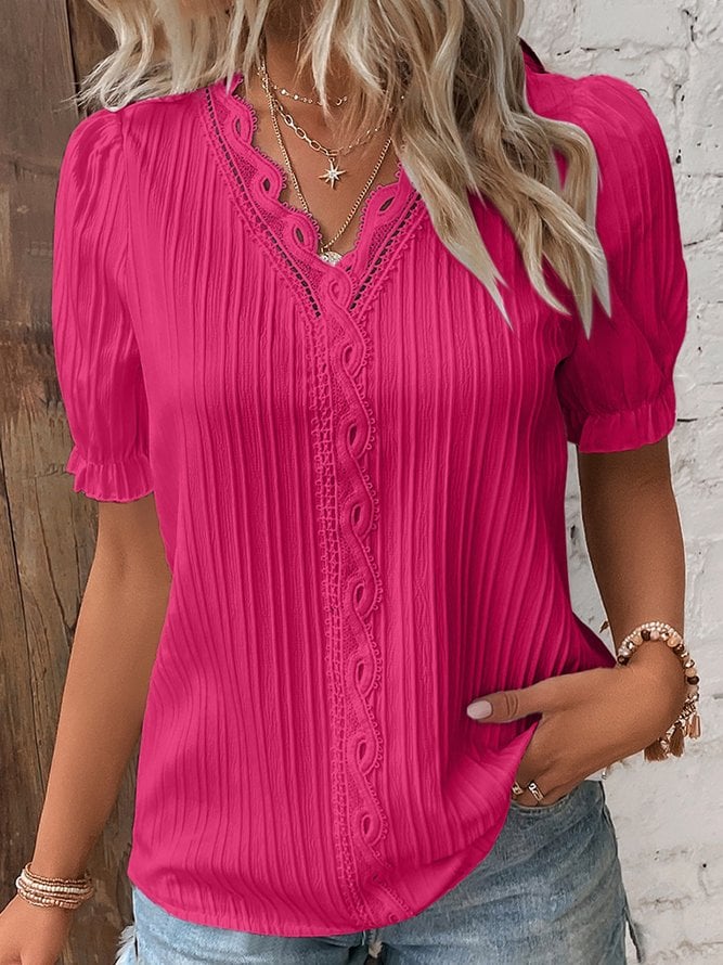 Chemise élégante en dentelle unie à col en V