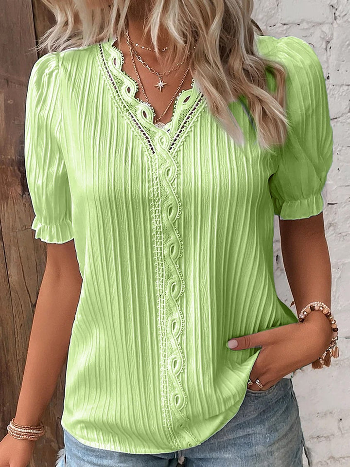 Chemise élégante en dentelle unie à col en V