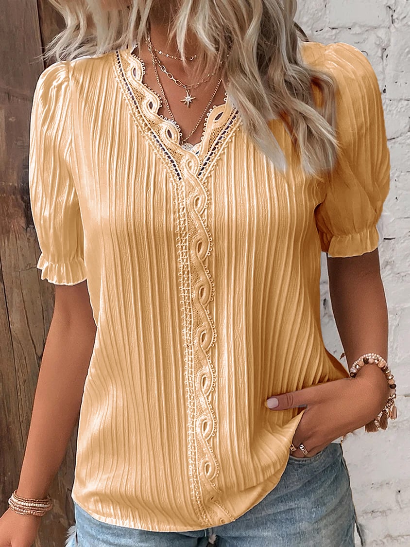 Chemise élégante en dentelle unie à col en V