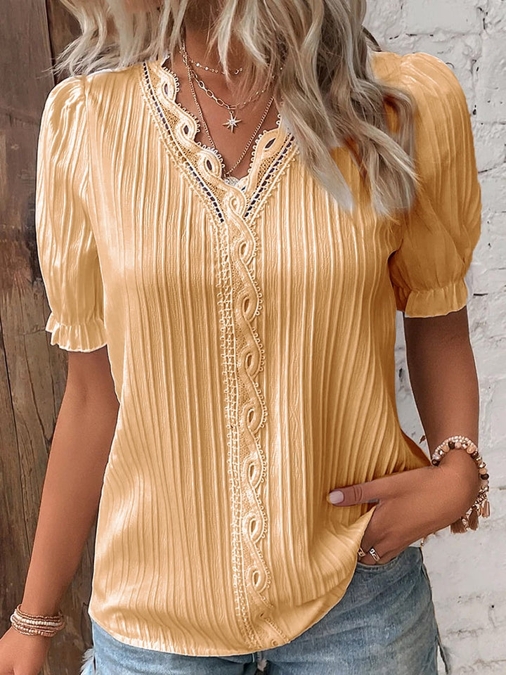 Chemise élégante en dentelle unie à col en V