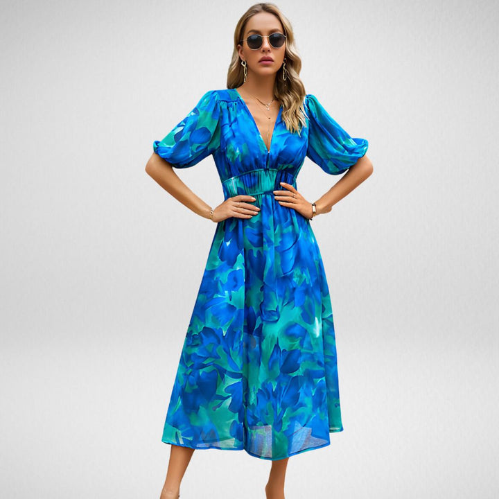 ABBY™| ROBE ÉLÉGANTE À COLl EN V ET MOTIFS VIBRANTS