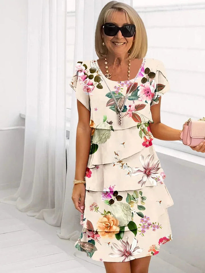 GISELLE™ | PLEATED FLORAL DRESS WITH RUFFLES