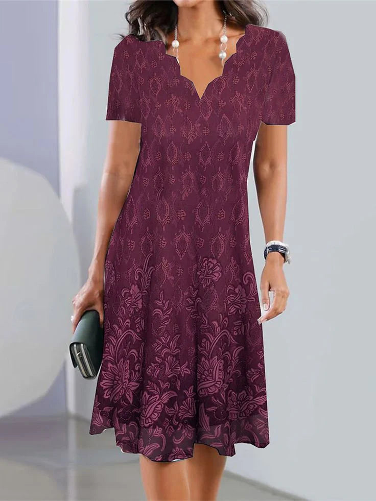 Robe mi-longue violette à manches courtes et col en V