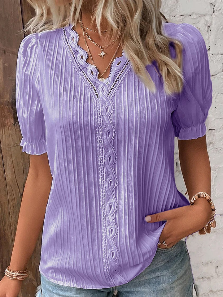 Chemise élégante en dentelle unie à col en V