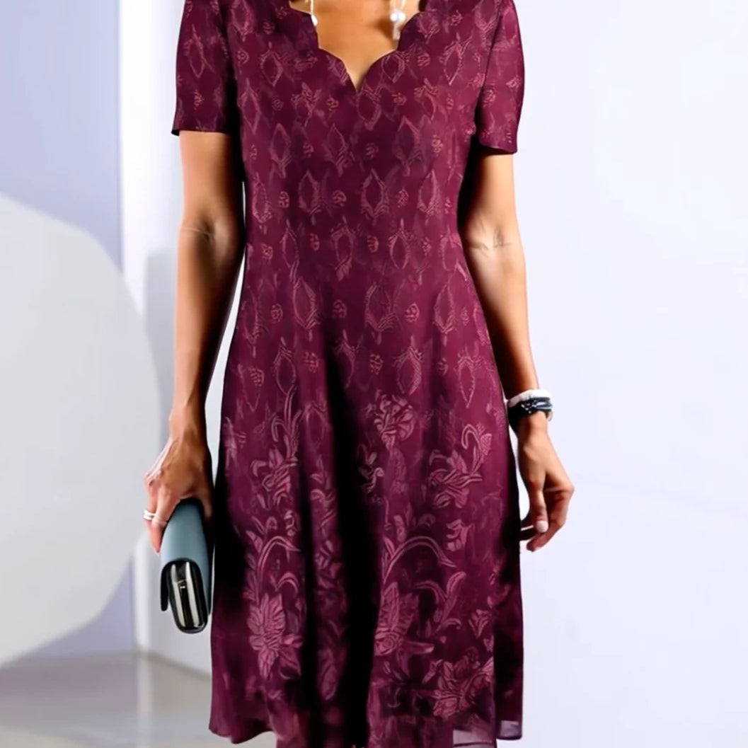 Robe mi-longue violette à manches courtes et col en V