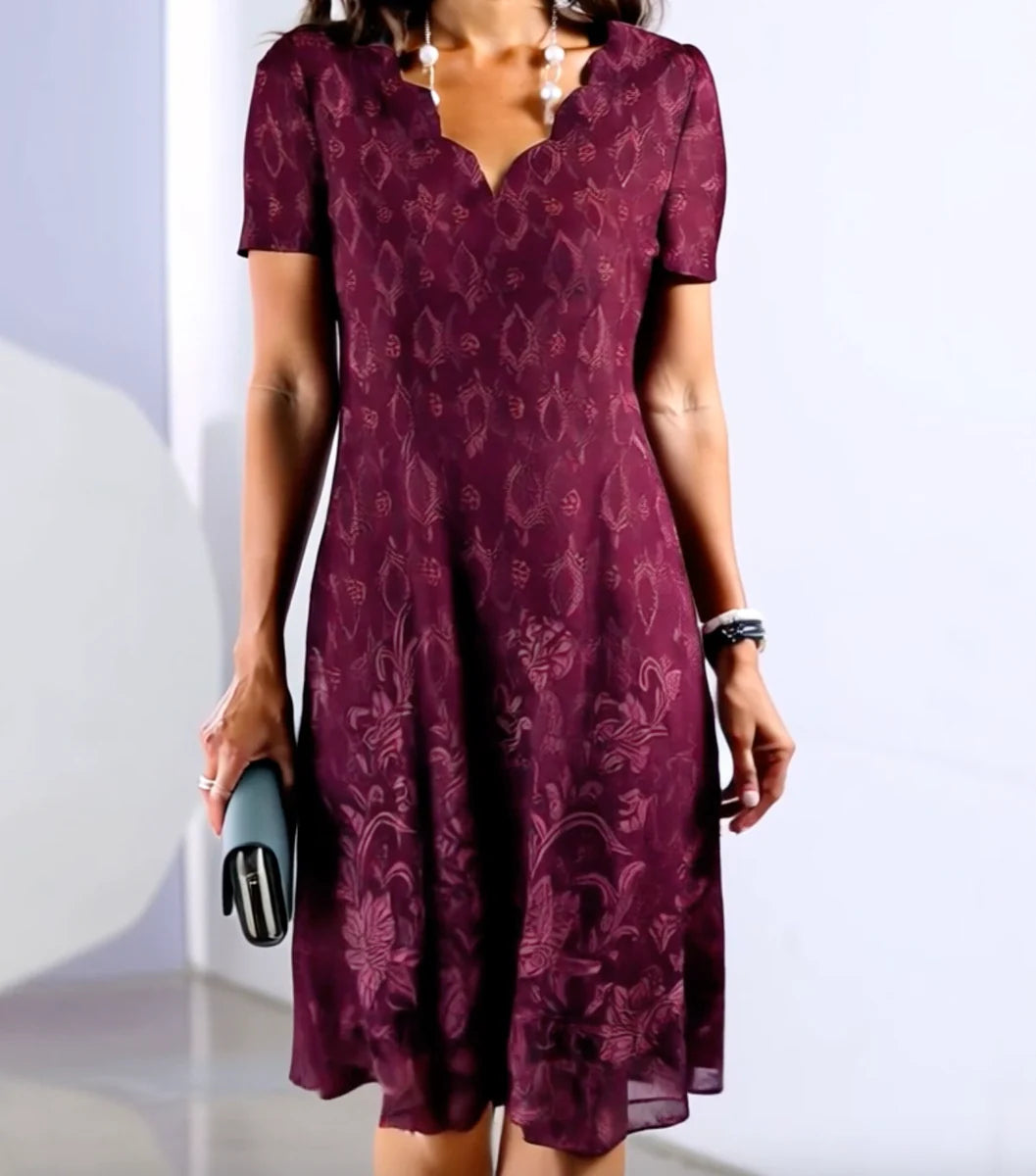 Robe mi-longue violette à manches courtes et col en V