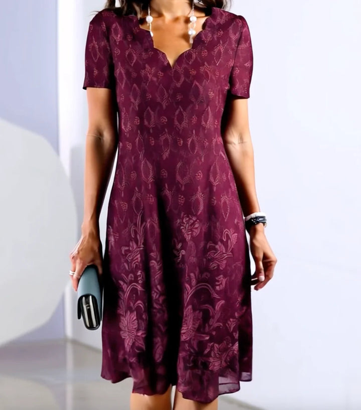 Robe mi-longue violette à manches courtes et col en V